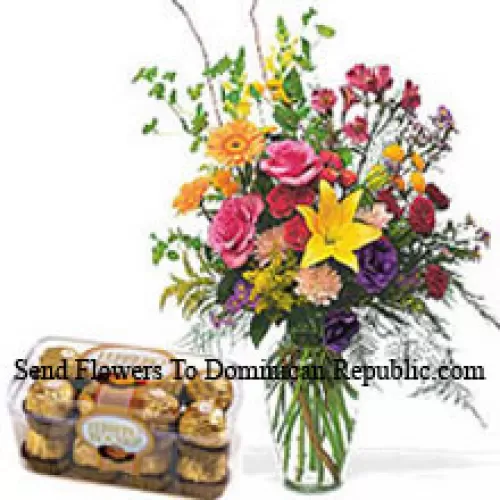 Fleurs assorties dans un vase avec 16 pièces Ferrero Rocher